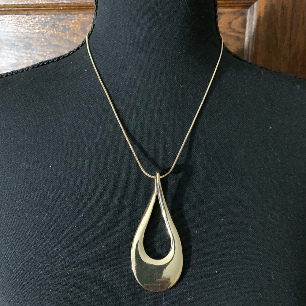 Beautiful gold designed necklace 10” with an extender.